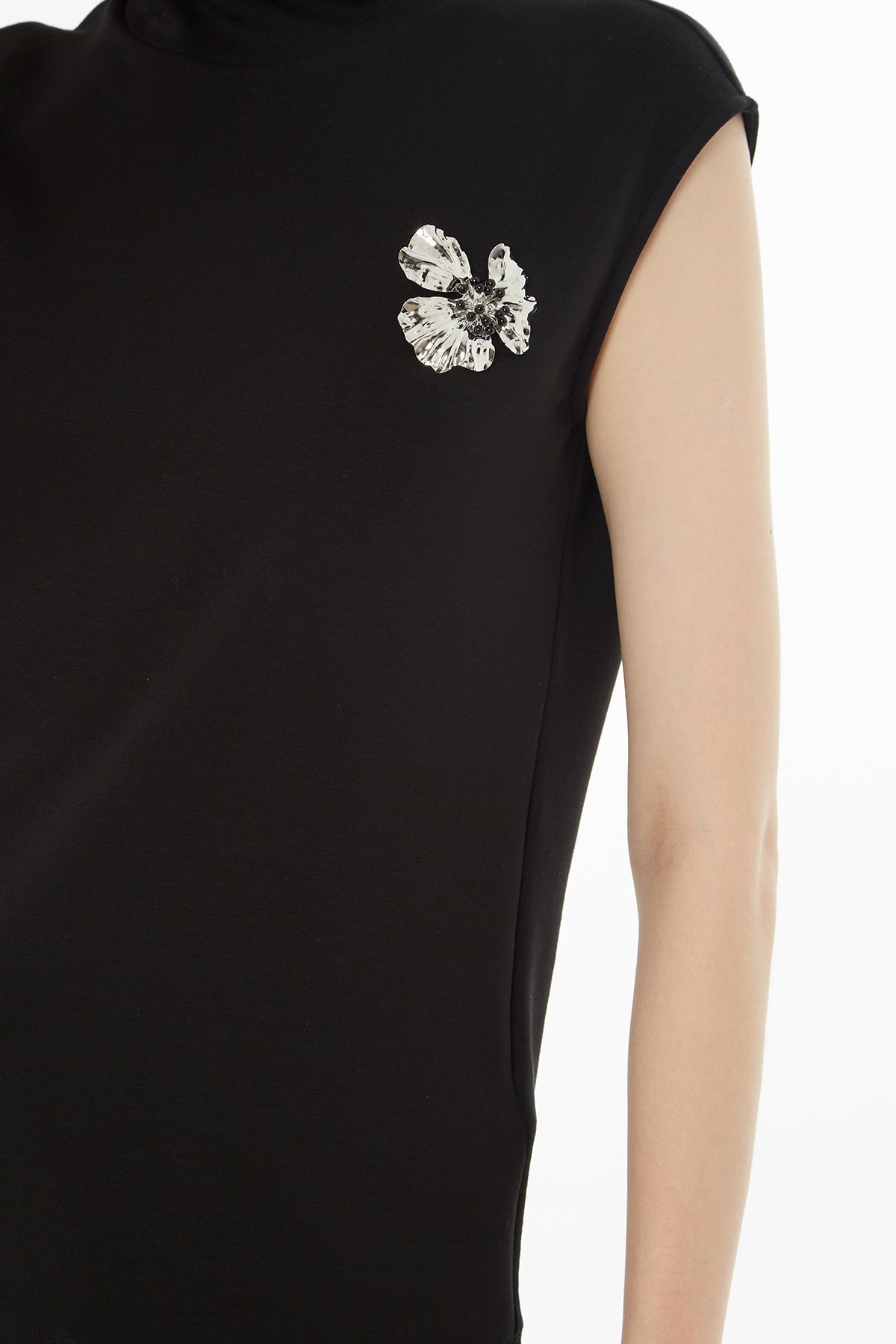 Black Blouse with Sewn Accessory Details